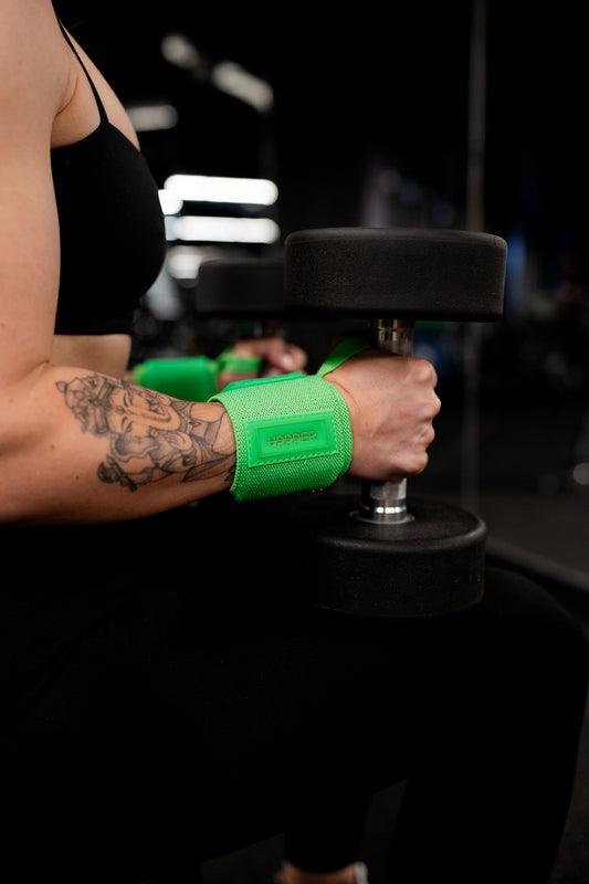 Woman using uppper wrist wraps